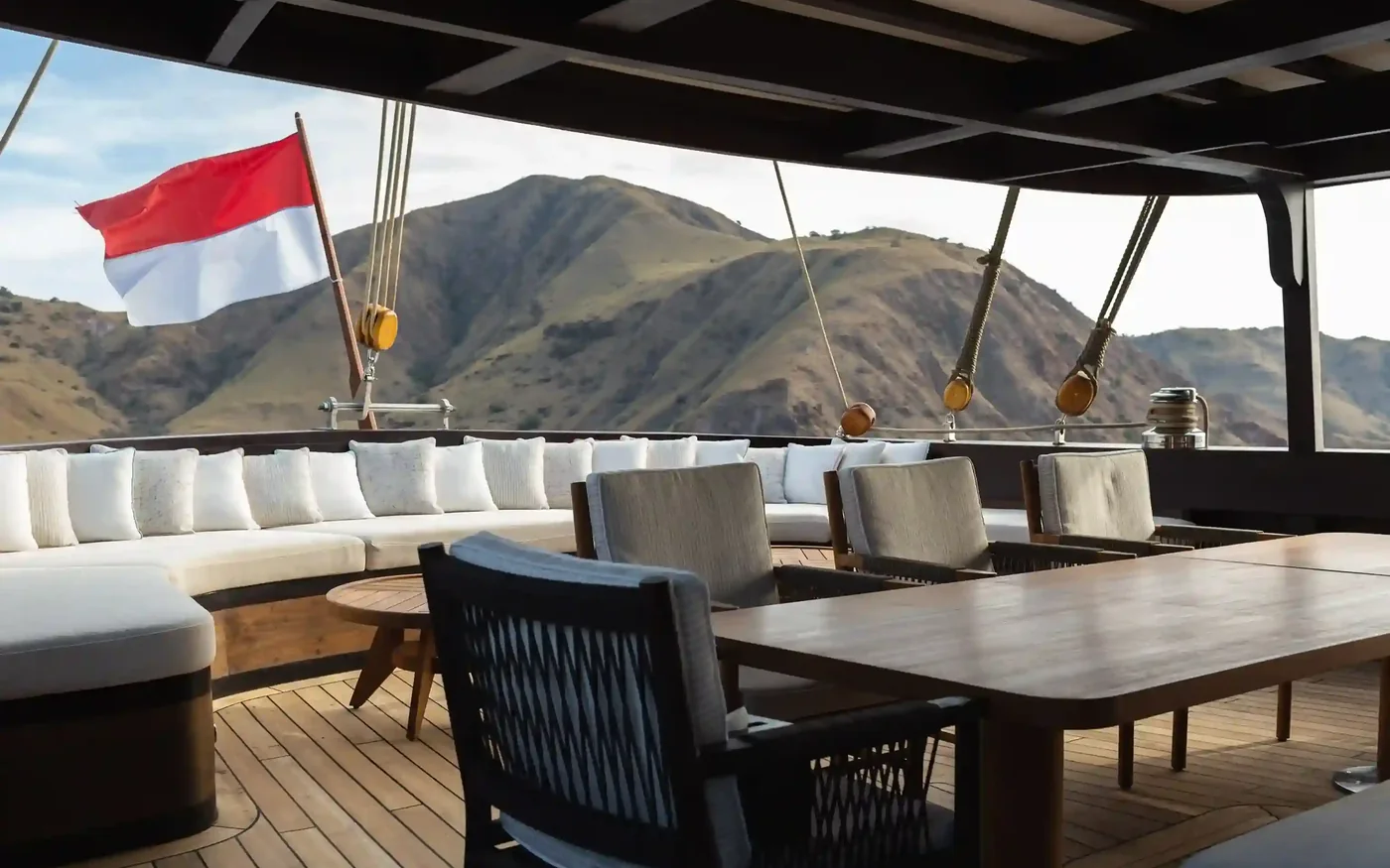 The aft deck of a charter yacht set for a private group gathering